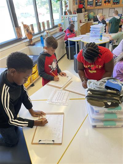 Students read quotes from leaders.
